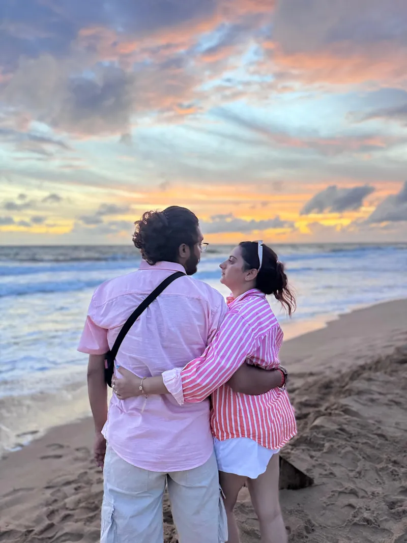 Couple at a beach sunset on a Sri Lanka honeymoon tour package